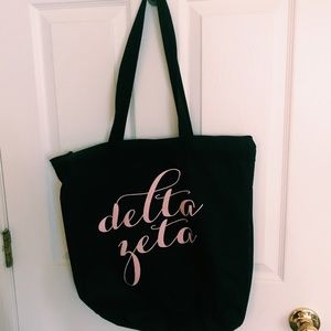 delta zeta black canvas bag